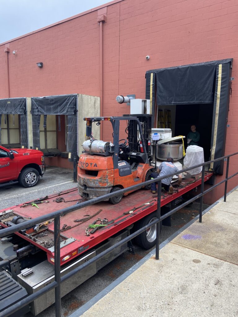 BTI used a forklift and tow truck to move Al's Backwoods Berrie